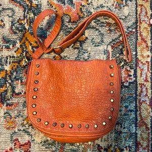 Vegan burnt orange leather studded purse by urban expressions adjustable strap